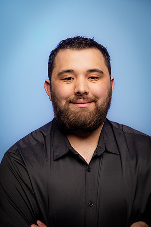 A fun and fresh approach to a headshot for this young man captured inside of the studio.